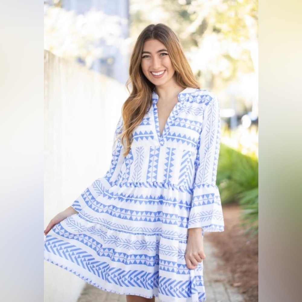 Super versatile short dress. sleeve runs snug
